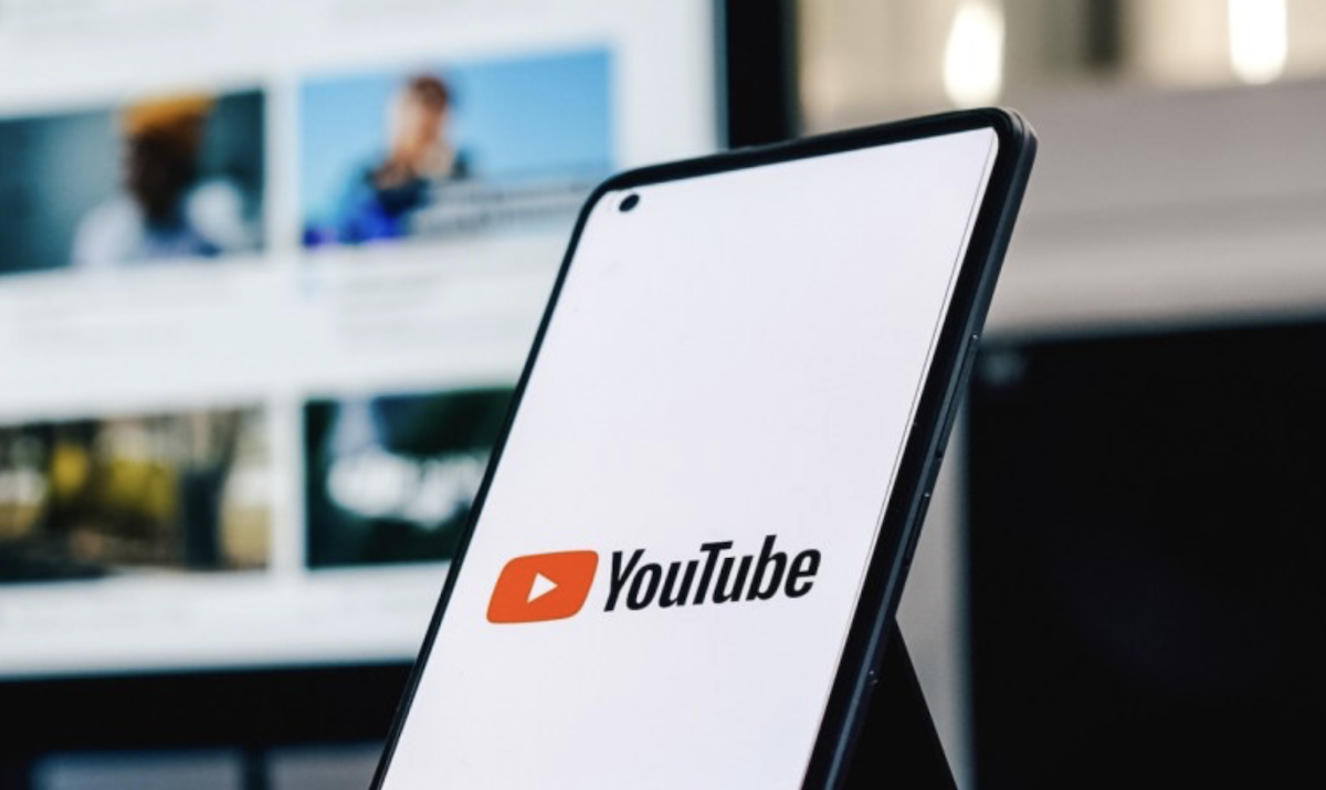 YouTube on phone with computer