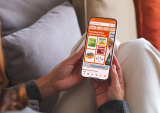 woman with Amazon app on phone