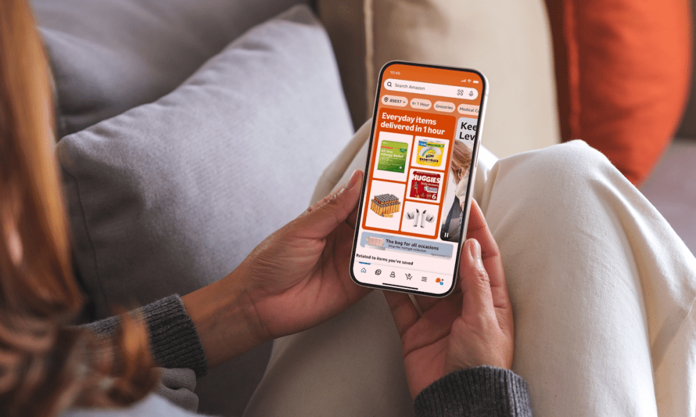 woman with Amazon app on phone
