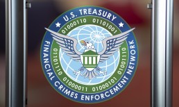 US Treasury financial crimes enforcement Network emblem, on a window