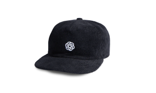 AI’s Biggest Flex Isn’t a Model. It’s a Cap.